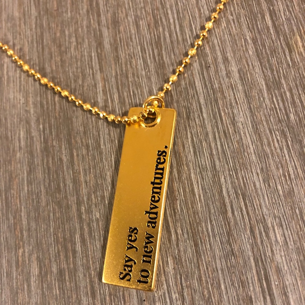 Long gold necklace